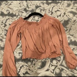 Cropped shirt off the shoulders